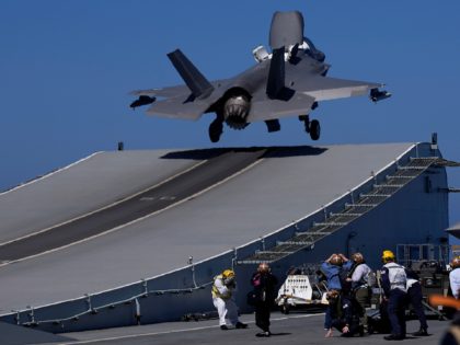 F-35 aircraft takes off from the U.K.'s aircraft carrier HMS Queen Elizabeth in the Mediterranean Sea on Sunday, June 20, 2021. The British Royal Navy commanders say the U.K.'s newest aircraft carrier HMS Queen Elizabeth is helping to take on the "lion's share" of operations against the Islamic State group …