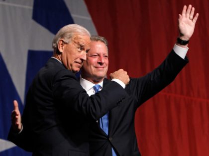 Vice President Joe Biden and former Vice President Al Gore, right, wave to the crowd after Gore introduced Biden at the annual Tennessee Democratic Party Jackson Day on Friday, July 16, 2010 in Nashville, Tenn. (AP Photo/Mark Humphrey)