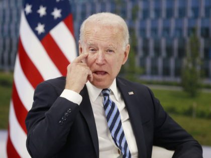 US President Joe Biden scratches his eye as he meets with NATO Secretary General during a NATO summit at the North Atlantic Treaty Organization (NATO) headquarters in Brussels on June 14, 2021. - The 30-nation alliance hopes to reaffirm its unity and discuss increasingly tense relations with China and Russia, …