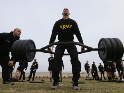 In this Jan. 8, 2019, photo, U.S Army 1st Lt. Mitchel Hess participates in a weight lifting drill while preparing to be an instructor in the new Army combat fitness test at Fort Bragg, N.C. The new test is designed to be a more accurate test of combat readiness than …
