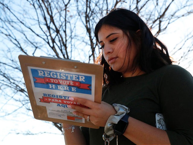 Karina Shumate, 21, a college student studying stenography, fills out a voter registration form in Richardson, Texas, Saturday, Jan. 18, 2020. Democrats are hoping this is the year they can finally make political headway in Texas and have set their sights on trying to win a majority in one house …