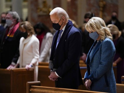 In this Wednesday, Jan. 20, 2021 file photo, President-elect Joe Biden and his wife, Jill Biden, attend Mass at the Cathedral of St. Matthew the Apostle during Inauguration Day ceremonies in Washington. When U.S. Catholic bishops hold their next national meeting in June 2021, they’ll be deciding whether to send …