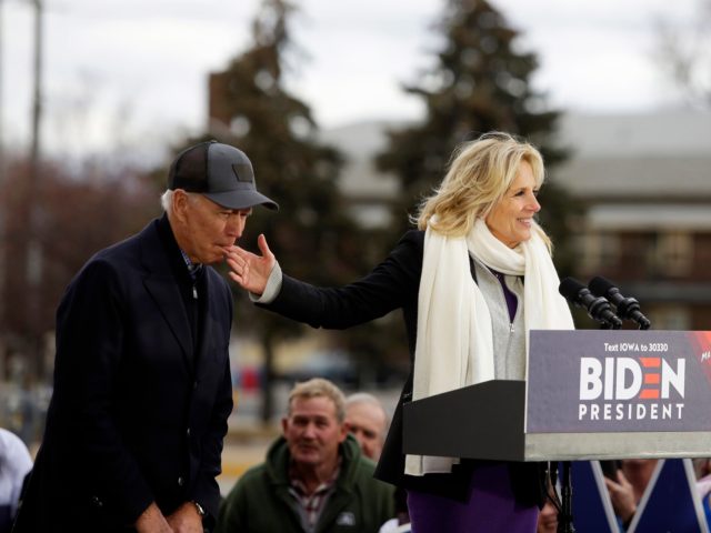 COUNCIL BLUFFS, IA - NOVEMBER 30: Democratic presidential candidate, former Vice President Joe Biden bites the finger of his wife Jill Biden as she introduces him during a campaign event on November 30, 2019 in Council Bluffs, Iowa. Biden, who begins his eight-day bus tour across Iowa on Saturday, once …