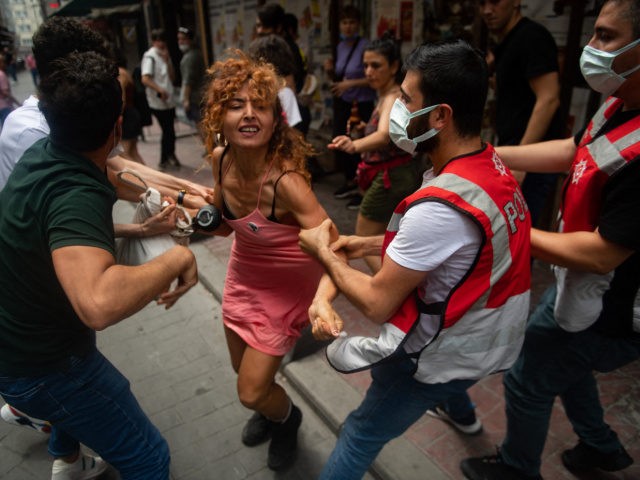 Protesters are detained by police in central Istanbul, on June 26, 2021, as hundreds of LG