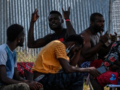 Migrants are seen at the San Vicente Migrants Reception Station (SRM) in Meteti, Darien Province, in Panama on February 9, 2021. - Migrants from Haiti and several African countries are stranded at the Panama-Colombia border, while the Central American country is expecting a new wave of migrants. (Photo by Luis …