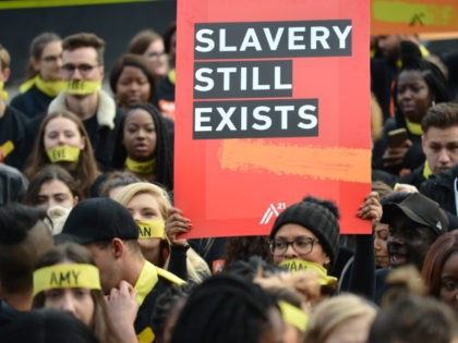 LONDON, UNITED KINGDOM - OCTOBER 14: People marching against modern slavery through London