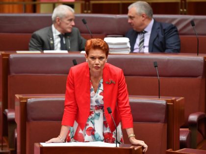 CANBERRA, AUSTRALIA - MARCH 18: Senator Pauline Hanson speaks as Senators Malcolm Roberts (top left) and Stirling Griff (top right) look on during debate of the Fair Work Amendment Bill 2021 in the Senate at Parliament House on March 18, 2021 in Canberra, Australia. Senator Stirling Griff has issued a statement confirming …