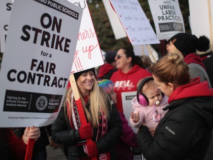 CHICAGO, ILLINOIS - OCTOBER 17: Chicago public school teachers and their supporters picket