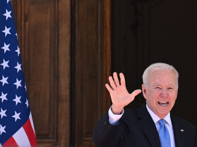 US President Joe Biden waves at press as he arrives to the US-Russia summit at the Villa La Grange, in Geneva on June 16, 2021. (Photo by Brendan Smialowski / AFP) (Photo by BRENDAN SMIALOWSKI/AFP via Getty Images)