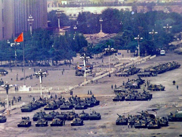 FILE - In this June 5, 1989 file photo, Chinese troops and tanks gather in Beijing, one da