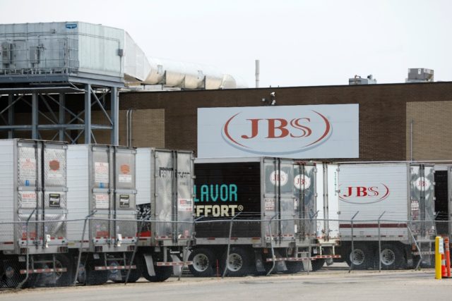 JBS, one of the world's biggest meat processors, says it has paid the equivalent of $11 mi