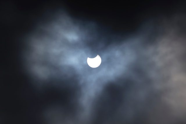 The eclipse, seen here from central London, was partly visible to observers in North Ameri