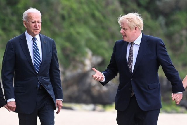 President Biden (l) will attend the G7 summit, on his first foreign trip, along with host