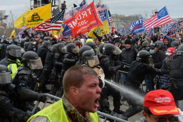 Donald Trump supporters clash with police and security forces as they storm the US Capitol on January 6, 2021