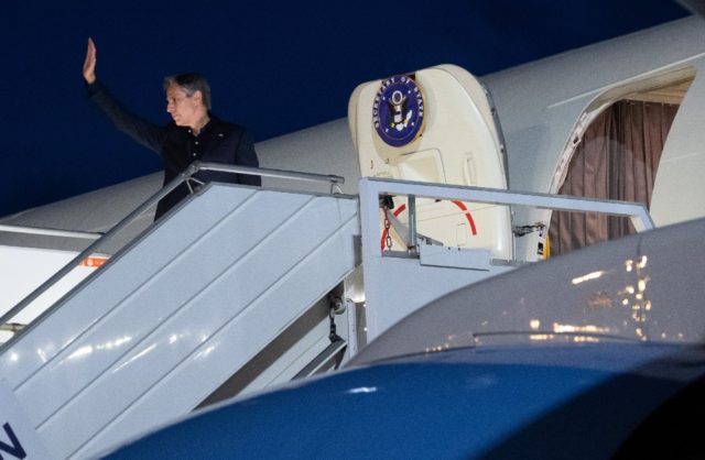 US Secretary of State Antony Blinken boards his airplane as he leaves Geneva following Pre
