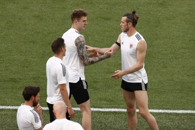 Captain Gareth Bale (R) trains with Wales teammates in Rome.