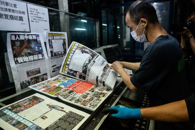 Hong Kongers snap up final edition of Apple Daily ...