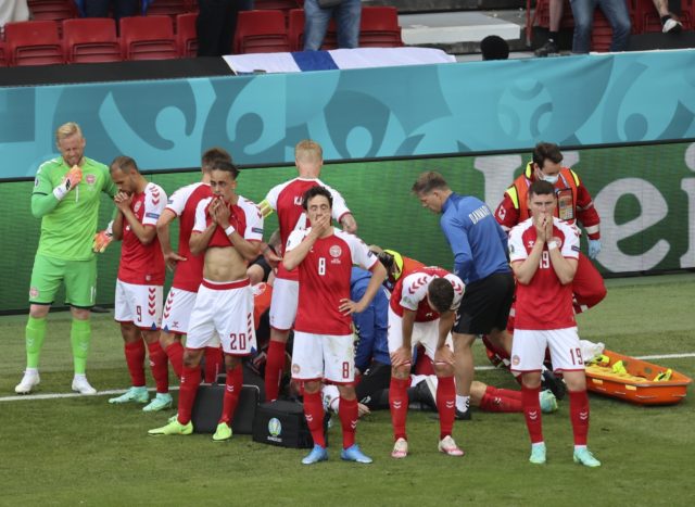 The Latest: Match suspended at Euro 2020, player collapses ...