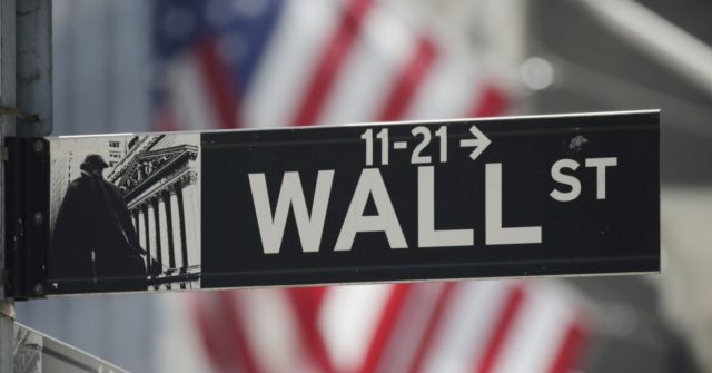 Rising tech stocks push Nasdaq, S&P 500 to new records; Dow drops 150