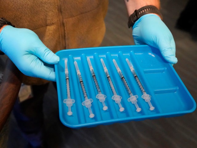 In this Jan. 6, 2021, file photo, syringes containing the COVID-19 vaccine are displayed i