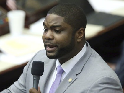 Rep. Byron Donalds, R-Naples, debates on a bill to allow teachers to be armed during session Wednesday May 1, 2019, in Tallahassee, Fla. (AP Photo/Steve Cannon)