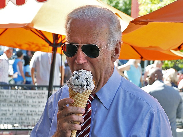 Vice President Joe Biden eats ice cream during a visit to Little Man Ice Cream, in Denver, Tuesday, July 21, 2015. (AP Photo/Brennan Linsley)