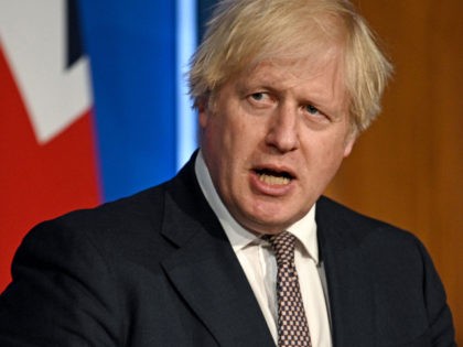 LONDON, ENGLAND - JULY 05: Britain's Prime Minister Boris Johnson gives an update on relaxing restrictions imposed on the country during the coronavirus covid-19 pandemic at a virtual press conference at Downing Street on July 5, 2021 in London, England. England's pandemic-related social restrictions were originally scheduled to end on …