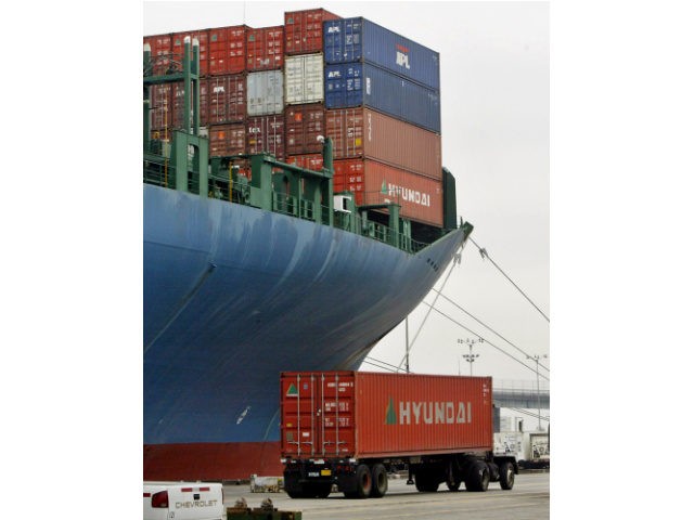 A truck departs after picking up a container Wednesday, Oct. 13, 2004, at the Port of Long Beach, Calif. The nation's largest port complex, already beset by delays, will experience in coming years a rising tide of Pacific Rim cargo. But what should be good economic news has instead exposed …