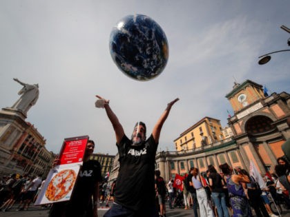 People demonstrate on the sidelines of a G20 environment meeting, in Naples, Italy, Thursd
