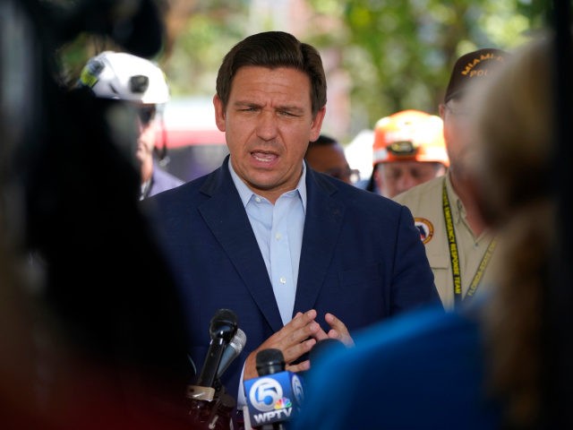 Florida Gov. Ron DeSantis speaks during a briefing near the Champlain Towers South condo b