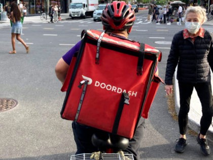 DoorDash allows restaurants to choose commissions in post-pandemic world. Here, a DoorDash delivery man is seen in Manhattan.