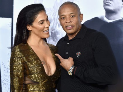 LOS ANGELES, CA - AUGUST 10: Nicole Young (L) and record producer Dr. Dre attend the Universal Pictures and Legendary Pictures' premiere of "Straight Outta Compton" at Microsoft Theater on August 10, 2015 in Los Angeles, California. (Photo by Kevin Winter/Getty Images)