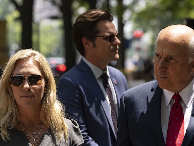 WASHINGTON, DC - JULY 27: (L-R) Rep. Marjorie Taylor Greene (R-GA), Rep. Matt Gaetz (R-FL) and Rep. Louie Gohmert (R-TX) unsuccessfully try to gain entry to the U.S. Department of Justice on July 27, 2021 in Washington, DC. The group of far-right conservatives held a news conference to demand answers …