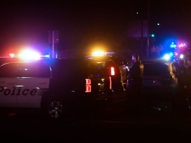 TOPSHOT - Police officers are seen at the intersection of US 101 freeway and the Moorpark