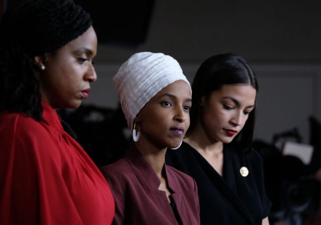 WASHINGTON, DC - JULY 15: (L-R) U.S. Reps. Ayanna Pressley (D-MA), Ilhan Omar (D-MN) and Alexandria Ocasio-Cortez (D-NY) listen during a news conference at the U.S. Capitol on July 15, 2019 in Washington, D.C. President Donald Trump stepped up attacks on the four progressive Democratic congresswomen, saying that if they're …