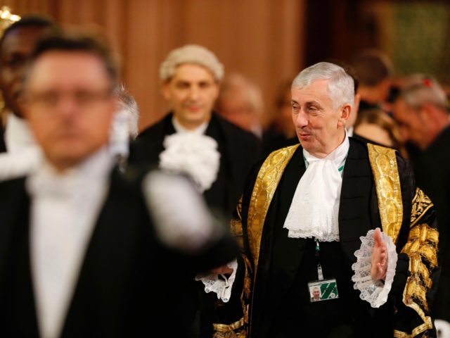 Speaker of the House of Commons Lindsay Hoyle heads to the Lords chamber through the Central Lobby during the State Opening of Parliament at the Houses of Parliament in London on December 19, 2019. - The State Opening of Parliament is where Queen Elizabeth II performs her ceremonial duty of …