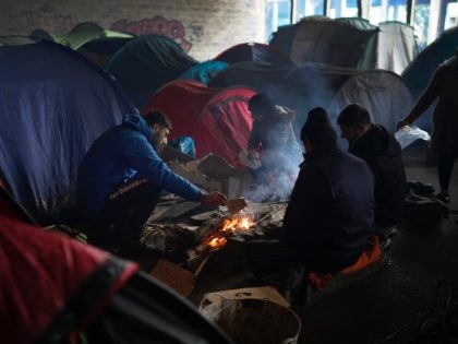 DUNKIRK, FRANCE - FEBRUARY 01: Migrant families from Iraq and Iran camp in a derelict industrial building on February 01, 2020 in Dunkirk, France. Migrants are still hopeful of reaching the United Kingdom and Northern Ireland even though has exited the European Union. (Photo by Christopher Furlong/Getty Images)