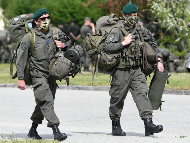 Austrian armed forces soldiers arrive to the RAAB barracks in Mautern, Austria, on May 4,