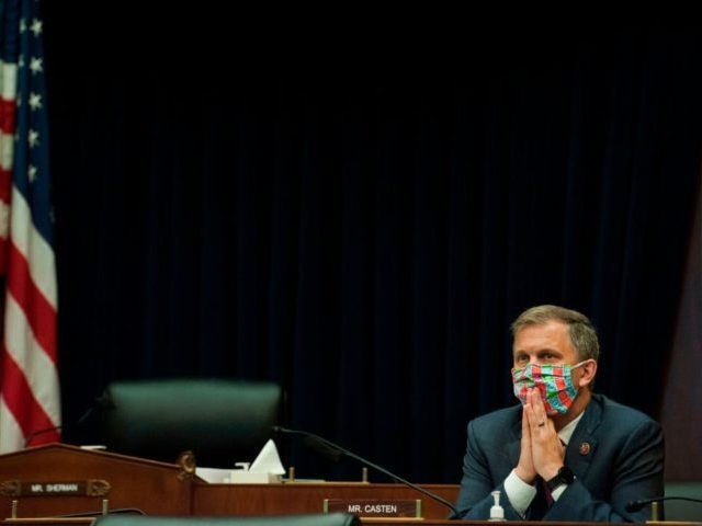Rep. Sean Casten, D-Ill, listens as US Securities and Exchange Commission Chairman Jay Clayton, speaks during a House Committee on Financial Services hearing entitled "Capital Markets and Emergency Lending in the COVID-19 Era" in the Rayburn House Office Building on Capitol Hill in Washington, DC on June 25, 2020. (Photo …