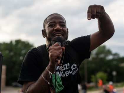 ST. ANTHONY, MN - JULY 06: John Thompson, candidate for Minnesota House District 67A, speaks during a march honoring his late friend Philando Castile on July 6, 2020 in St. Anthony, Minnesota. Philando Castile was shot and killed during a traffic stop by Jeronimo Yanez, an officer with the St. …