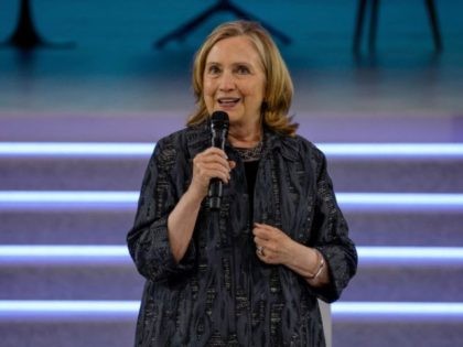 Former US Secretary of State Hillary Clinton delivers a speech during the opening session