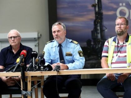 (L-R) Per-Ove Staberyd, chief of the fire department, Niclas Hallgren, police officcer, an