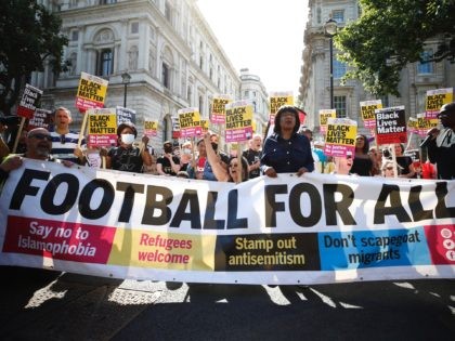 LONDON, ENGLAND - JULY 17: Labour MP Diane Abbott attends a Stand Up to Racism rally outside Downing Street on July 17, 2021 in London, England. Stand Up to Racism Supporters took the knee in solidarity with footballers Marcus Rashford, Bukayo Saka and Jadon Sancho who have been the target …