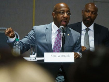 ATLANTA, GA - JULY 19: U.S. Sen. Raphael Warnock (D-GA) speaks during a U.S. Senate Rules Committee Georgia Field Hearing on the right to vote at the National Center for Civil and Human Rights on July 19, 2021 in Atlanta, Georgia. Senate Democrats are trying to keep a focus on …