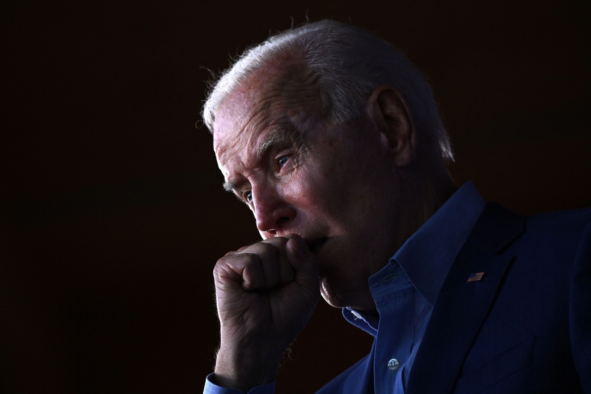 US President Joe Biden clears his throat as he speaks during a campaign event for Virginia gubernatorial candidate Terry McAuliffe at Lubber Run Park, Arlington, Virginia on July 23, 2021. (Photo by Brendan SMIALOWSKI / AFP) (Photo by BRENDAN SMIALOWSKI/AFP via Getty Images)