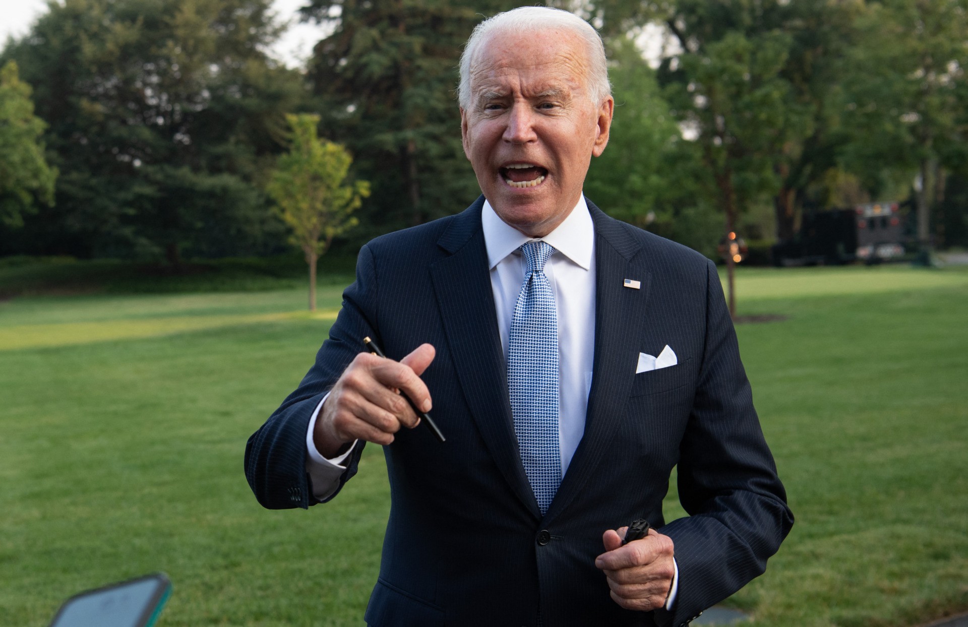 US President Joe Biden speaks to the media as he walks to Marine One prior to departure from the South Lawn of the White House in Washington, DC, July 29, 2021, as he travels to Walter Reed National Military Medical Center in Maryland where First Lady Jill Biden is having a medical procedure. (Photo by SAUL LOEB / AFP) (Photo by SAUL LOEB/AFP via Getty Images)