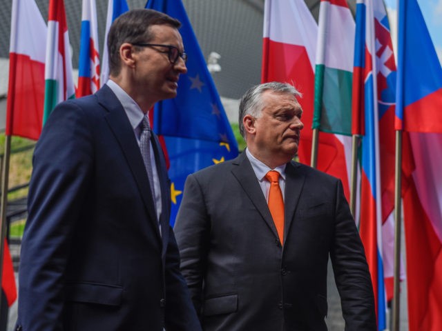 KATOWICE, POLAND - JUNE 30: Poland's Prime Minister, Mateusz Morawiecki welcomes the Prime Minister of Hungary, Viktor Orban during a Heads of State meeting of the Visegrad group at International Congress Center on June 30, 2021 in Katowice, Poland. The heads of state of Poland, Hungary, Slovakia and the Czech …
