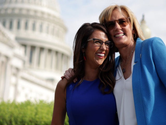WASHINGTON, DC - JULY 01: U.S. Rep. Lauren Boebert (R-CO) (L) and Rep. Claudia Tenney (R-NY) (R) share a moment as they wait for the beginning of a news conference in front of the U.S. Capitol July 1, 2021 in Washington, DC. House Republicans held a news conference to introduce …