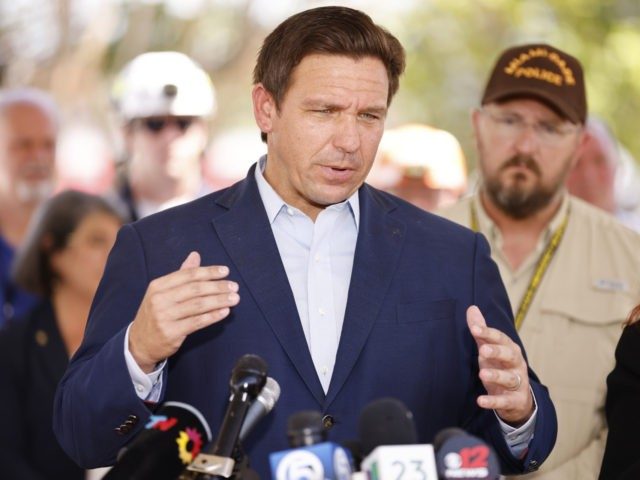 SURFSIDE, FLORIDA - JULY 03: Florida Gov. Ron DeSantis speaks to the media about the 12-story Champlain Towers South condo building that partially collapsed on July 03, 2021 in Surfside, Florida. Over one hundred people are being reported as missing as the search-and-rescue effort continues. (Photo by Michael Reaves/Getty Images)