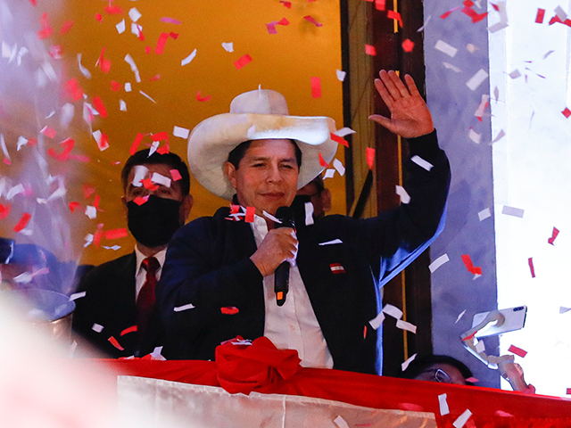 Newly Elected President of Peru Pedro Castillo waves supporters during a celebration after